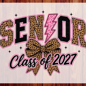 May include: A graphic design featuring the word SENIOR with a lightning bolt replacing the letter I, rendered in a leopard print pattern with pink outlines. Below, a large leopard print bow sits above the text Class of 2027 in black script.