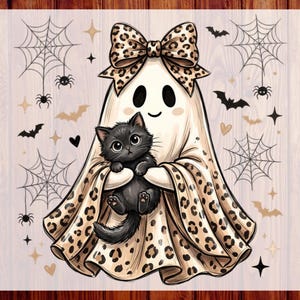 May include: A graphic print featuring a white ghost wearing a large leopard print bow, holding a small black kitten. The design includes black spiderwebs, spiders, bats, and stars. The text CUSTOM DTF READY TO PRESS is on the sides.