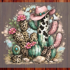 May include: A watercolour illustration of a cactus scene featuring a pink cowboy hat, cacti, and pink flowers. The cacti have a cow print and leopard print design. The text "CUSTOM DTF" and "READY TO PRESS" are visible on the sides.