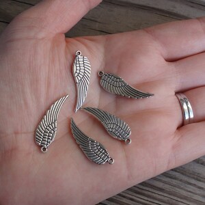 thumbnail image 2 of Xanadu Designs Angel Wing Charms / Pendants - 57mm, Antiqued Silver Plated (C8117) - Choose 2, 5, Or 10 2 of 5