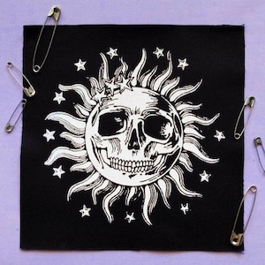 Parches para coser de Halloween con calaveras solares y estrellas