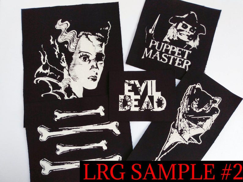 May include: A collection of black patches with white graphic designs. The patches feature images of classic horror movie characters, the words "EVIL DEAD", and bone illustrations. The text "PUPPET MASTER" is also visible.