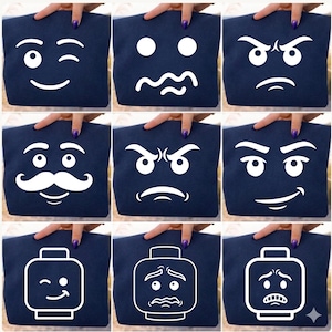 May include: Nine navy blue tote bags with white emoji faces. The emoji faces include winking, confused, angry, mustached, and Lego-style faces. The bags are being held by a person with purple nail polish.