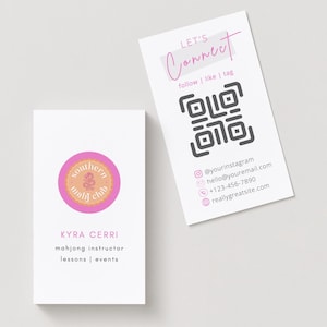 May include: Two white business cards. One card features a pink and orange logo for "Southern Mahj Club" and the name "Kyra Cerri" with contact information. The second card says "Let's Connect" with a QR code and social media handles.