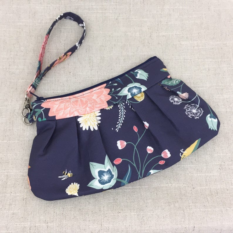 navy floral clutch bag