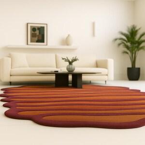 Low angle view of abstract wavy area rug highlighting dimensional edges and soft wool texture.