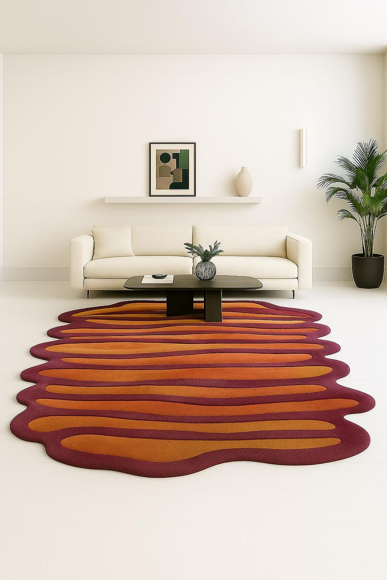 Large retro mid century modern rug placed under coffee table in neutral living room interior.