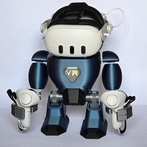 May include: A blue and white robot figure with a VR headset and controllers. The robot has a white head with three black dots and the letters "VR" on its chest. The arms and legs are blue and white.