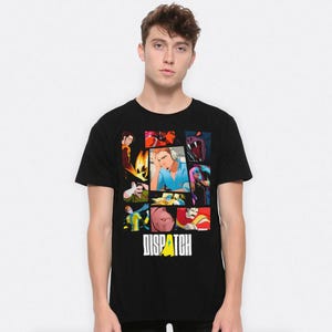 May include: Black t-shirt with a vibrant graphic design composed of cartoon panels. The word "DISPATCH" is printed in white with a yellow accent. The t-shirt is being worn by a person.