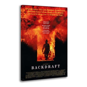 Peut inclure: A framed poster for the film "Backdraft." The poster features a fiery background with a silhouette of a firefighter walking towards the viewer. The title of the film is prominently displayed, along with the names of the actors.