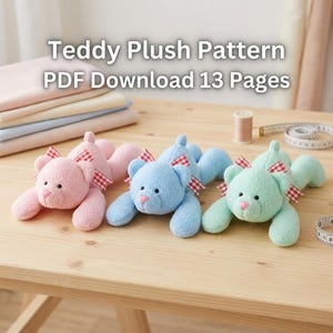 May include: Three plush teddy bears in pink, blue, and mint green, each wearing a red and white checkered bow. The text "Teddy Plush Pattern PDF Download 13 Pages" is visible above the bears, alongside fabric stacks and a measuring tape.