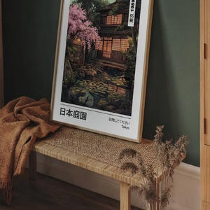 May include: Framed art print depicting a Japanese garden scene with a traditional building, cherry blossoms, and a pond. The print has text in Japanese and English, and is displayed on a wooden bench with a woven top. The text "Tokyo 1989" is visible.