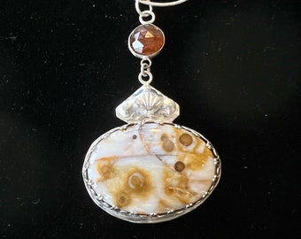 Elegant pendant of gold and white jasper and rose cut carnelian all set in Sterling Silver.