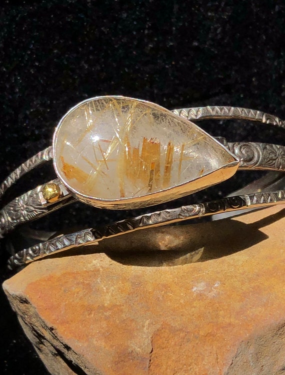 Triple sterling band cuff with stunning Rutile Quartz pear shaped stone and 24k gold accent.