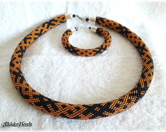 Ethnical ornament,Latvian ornament, bead crochet necklace, bracelet, black, orange, handmade unique, OZOLINS pattern, statement jewelry