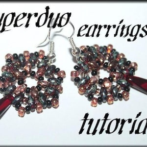 May include: A pair of earrings with a tutorial. The earrings are made of black, red, and gold beads. The earrings are in the shape of a flower.