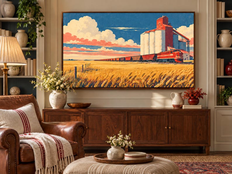 May include: A rectangular wall art print featuring a vibrant landscape painting of a red freight train passing by tall white grain silos. The scene includes a vast golden wheat field under a blue sky with large white and pink clouds.