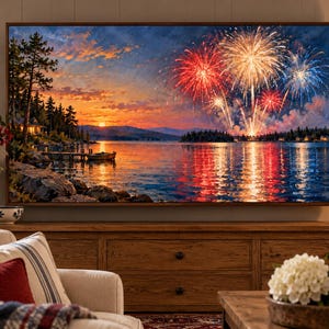 May include: A rectangular wall art print featuring a vibrant sunset over a calm lake with a small boat docked near a pine-covered shoreline, illuminated by large, colorful red, gold, and blue fireworks bursting in the night sky above.