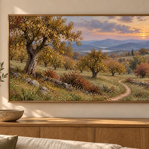 May include: A rectangular landscape painting in a wooden frame depicting an orchard with golden-leaved trees, a winding dirt path, and a stone wall under a sunset sky. The scene features rolling hills, distant mountains, and warm light.