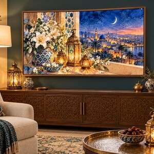 May include: A rectangular wall art print featuring a vibrant scene of a Middle Eastern city at twilight with a crescent moon, illuminated lanterns, and a vase filled with white lilies, all set against a deep blue sky and warm city lights.
