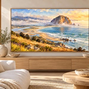 May include: A large rectangular landscape painting in a thin wooden frame depicting a coastal scene with a prominent rock formation, rolling hills, and a sandy beach. The artwork features a vibrant sky, blue ocean waves, and golden grassy terrain.