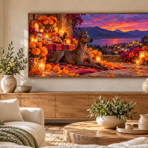 May include: A rectangular wall art print featuring a Xoloitzcuintli dog resting on a colorful blanket surrounded by bright orange marigold flowers, lit candles, and sugar skulls, with a sunset landscape of a lake and town in the background.