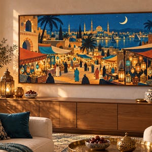 May include: A rectangular wall art print depicting a bustling night market scene with colourful stalls, hanging lanterns, and people in traditional clothing. In the background, a city skyline with domes and minarets sits under a crescent moon.