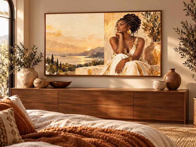 May include: A rectangular wall art print featuring a portrait of a person with dark skin and braided hair, wearing a light-colored dress, positioned against a scenic coastal landscape with a sunset, hills, and water in warm golden and brown tones.