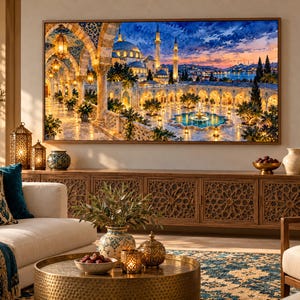 May include: A large rectangular wall art print depicting a mosque courtyard at sunset with illuminated arches, a central fountain, and a blue sky. The artwork is framed in wood and displayed above a long wooden cabinet with intricate carved patterns.
