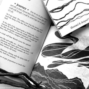 May include: Black and white illustration of a journey through a landscape with mountains and clouds. The text *journey* is highlighted in the image. The text *Illustrated & designed by Ruth Thorp* is also visible in the image.