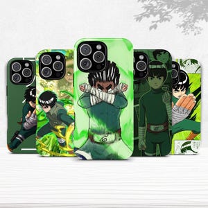 May include: A white ceramic mug with a black handle and the text "But First, Coffee" in a black, handwritten-style font. The mug is on a white surface.