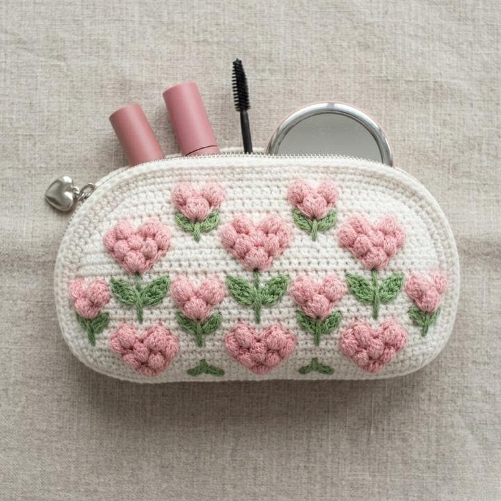 26 Crochet Makeup Bag Patterns with Clutches, Pouches, and Holders 2 Crochet Heart Makeup Bag Pattern Textured Popcorn Stitch