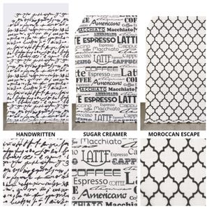May include: Three fabric panels with different patterns. One features black handwritten script on white, another has coffee-related words in black on white, and the third has a black Moroccan trellis design on white.