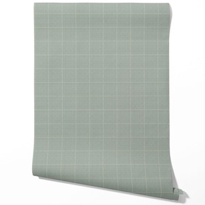 Peut inclure: Un rouleau de papier peint vert clair avec un motif quadrillé de fines lignes blanches. Le papier peint est partiellement déroulé, révélant le motif et la texture. Le design est un motif géométrique simple.