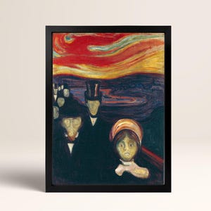 May include: A framed print of Edvard Munch's "The Scream" features a vibrant, swirling sky of red, orange, and yellow above a dark landscape. Figures with anguished expressions are in the foreground, with a person in the center wearing a top hat.