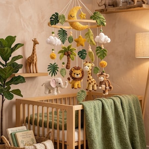 May include: A white ceramic mug with a black handle and the text "But First, Coffee" in a bold, black font. The mug is set against a blurred background, suggesting a cozy setting.