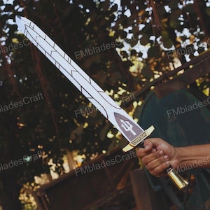 May include: A white and brown sword with a gold handle and a trident symbol. The blade has a geometric design. The handle is held in a hand.