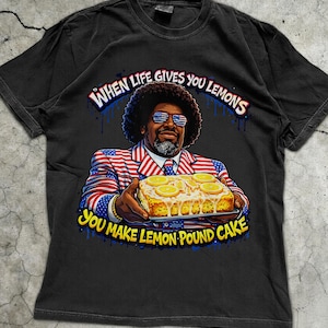 May include: A set of three ceramic mugs with a speckled, matte finish. The mugs are in shades of cream, light gray, and dark gray. Each mug has a simple, minimalist design and a rounded handle.