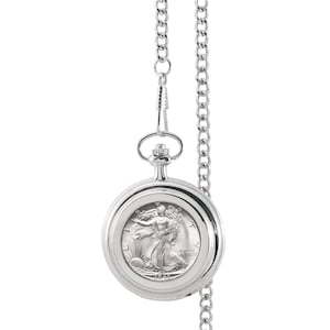 May include: Silver pocket watch with a chain. The face of the watch features a design of the Walking Liberty half dollar coin.