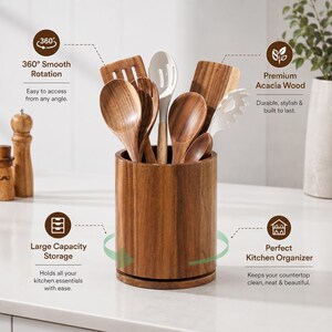 May include: A cylindrical acacia wood kitchen utensil holder containing various wooden and white silicone cooking tools. The holder features a 360-degree rotation base, large capacity storage, and a natural wood grain finish for kitchen organization.