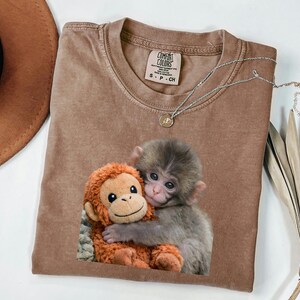 Baby Monkey Shirt, Cute Animal Tee, Hugging Plush Toy Top, Wildlife Lover Gift for Her, Zoo Keeper Apparel image 1