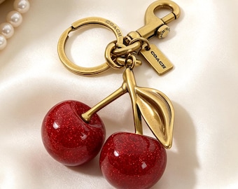 Coach Signature Cherry Bag Charm – Stylish Beautify Edition