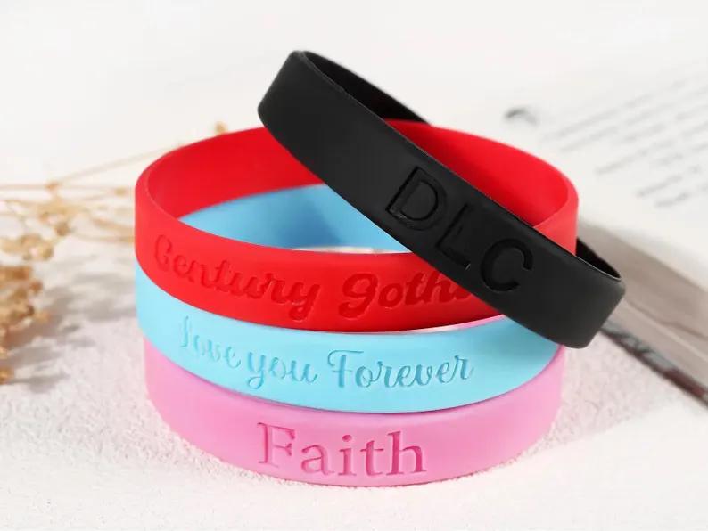 Braccialetti in silicone con il tuo testo o logo Braccialetti in silicone con il tuo testo o logo