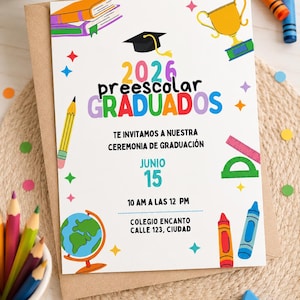 May include: A graduation announcement with the text "2026 preescolar GRADUADOS" and other text in Spanish. The invitation features colorful illustrations of school supplies and a graduation cap. The announcement is on a white background.