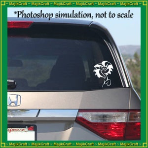 May include: A white vinyl decal of a cartoon character with a large mane of hair, a small body, and a long tail. The decal is placed on the back window of a silver car. The text "*Photoshop simulation, not to scale" is visible at the top of the image.