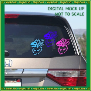 May include: Digital mock-up of three furry animal head decals in blue, pink, and purple on a car window. The text "DIGITAL MOCK UP NOT TO SCALE" is at the top of the image.
