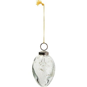 May include: A clear, egg-shaped Christmas bauble with a silver-coloured, textured finish. The bauble has a metal cap and a gold-coloured string with a tassel for hanging. Ideal for festive decorations.