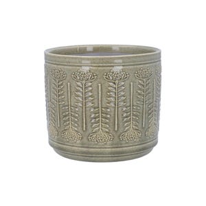 May include: A round, sage green ceramic plant pot with a textured floral pattern. The pot has a wide, cylindrical shape with a slightly flared base and a smooth rim. The embossed design features stylized flowers and leaves.
