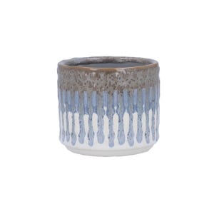 May include: A small, cylindrical ceramic planter with a textured, dripped glaze design. The top section is a mottled brown, transitioning to a blue and white drip pattern. The base is white.
