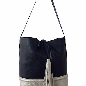 Black & Champagne Pebbled  Leather Bucket Bag with Tassels Accent